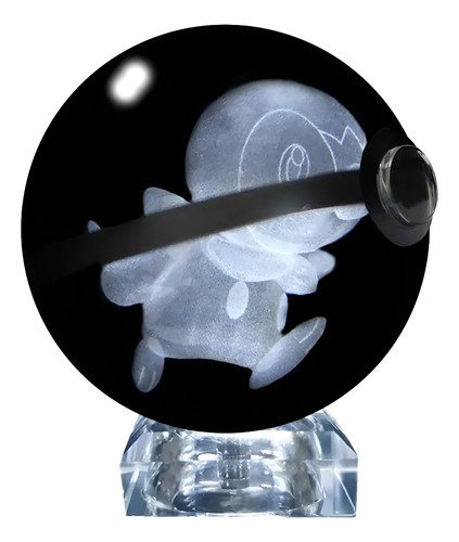 Pokebola de cristal 3D con luz LED mostrando figura Pokémon encapsulada, ideal para decoración gaming